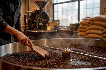 Freshly roasted coffee beans cooling in roaster tray