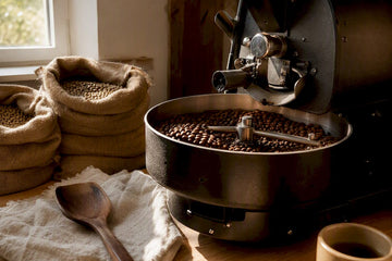 Home roaster mid-batch in sunlit kitchen