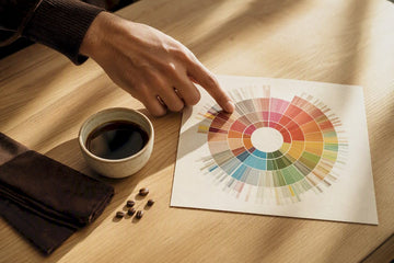 Home brewer studying a coffee flavor wheel